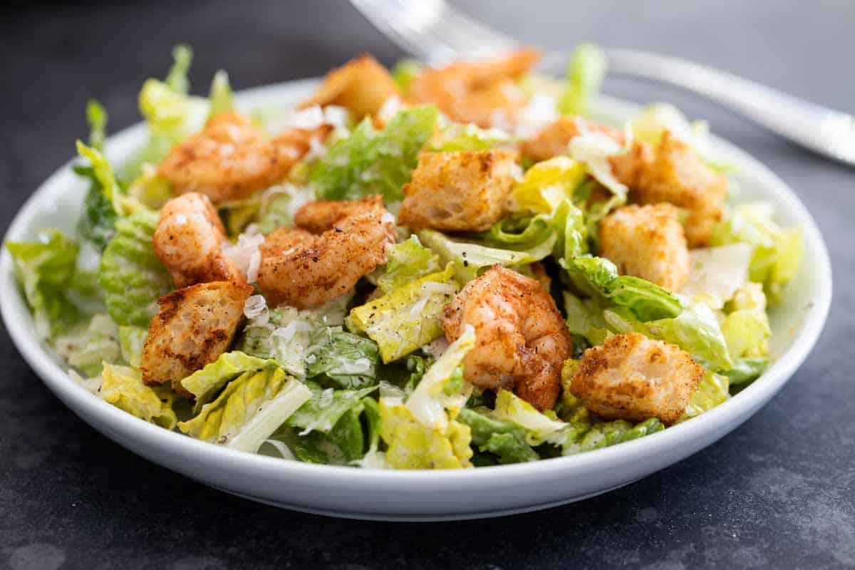 Shrimp Caesar salad with spicy croutons